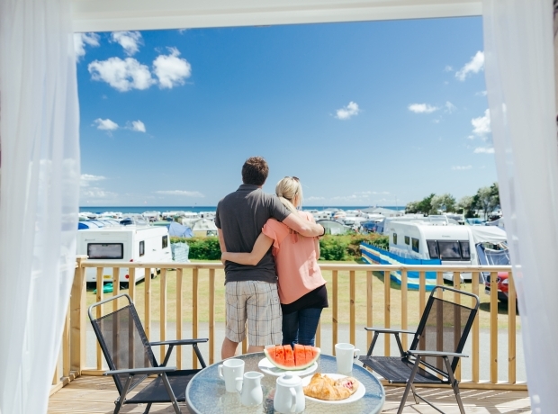 A couple enjoying the view at Pentewan Sands Holiday Park in Cornwall